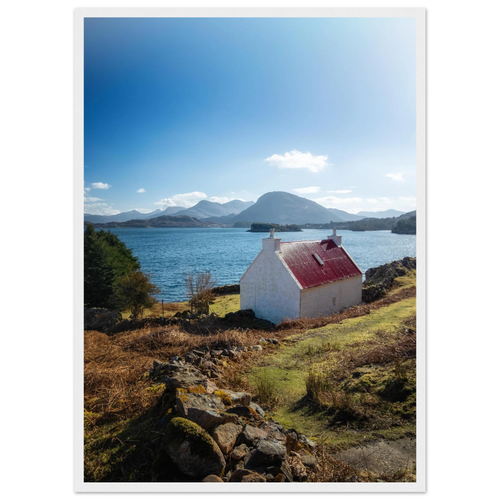 Red-roofed cottage on the rugged Applecross coast in
Scotland